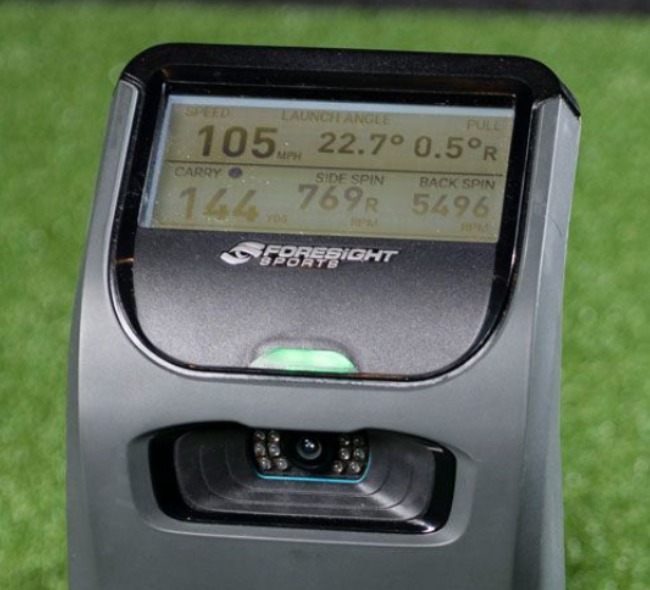 Close view of Foresight GC3 display showing golf ball-flight data used for coaching feedback