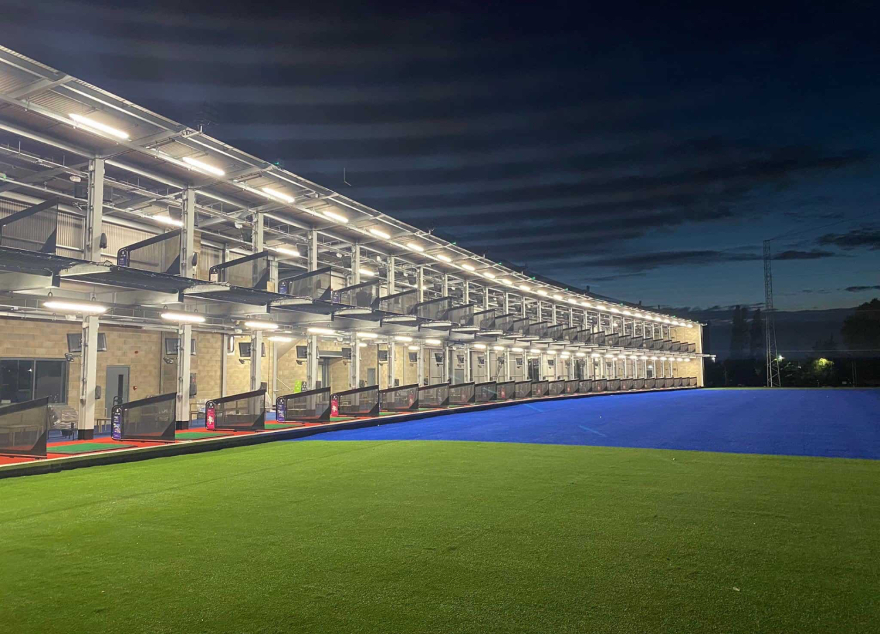 Good Time Golfin range lit in the evening