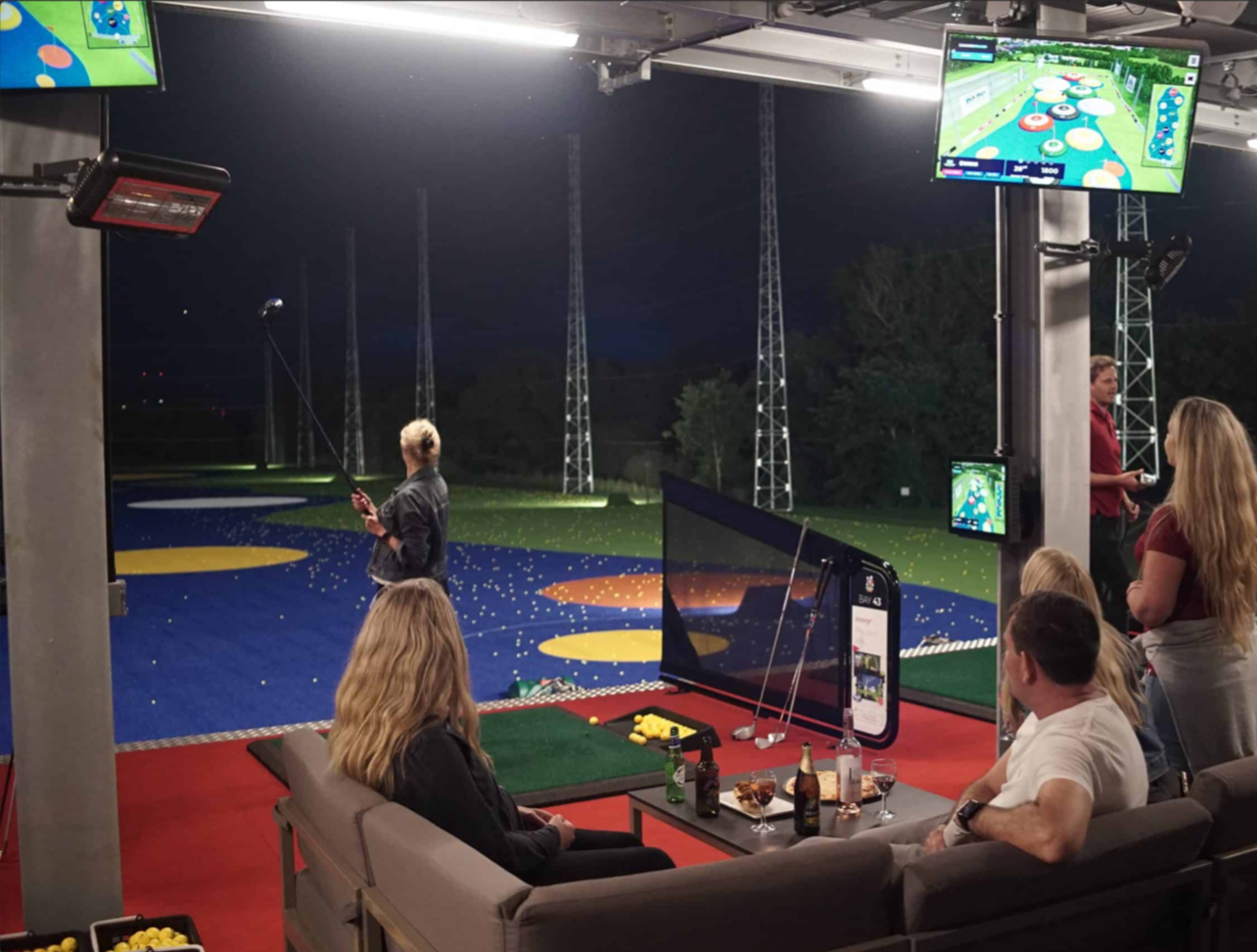 Golfers enjoying the social atmosphere at Good Time Golfin